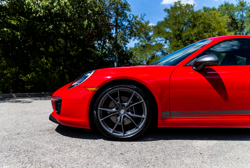Steel brake rotors are hidden behind the T’s standard 20-inch wheels. I want the PCCBs.